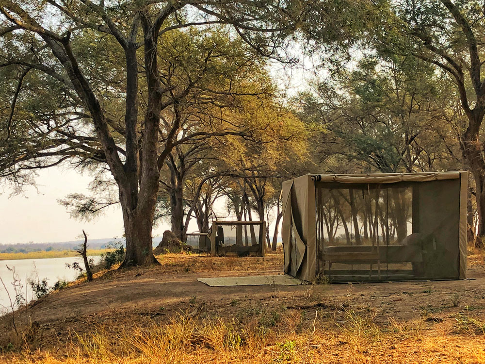 https://www.remoteafrica.com/wp-content/uploads/2019/10/SML-Tent-View-6-at-Kutali-Island-Camp-.jpg